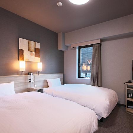 Hotel Route-Inn Toyama Ekimae Экстерьер фото