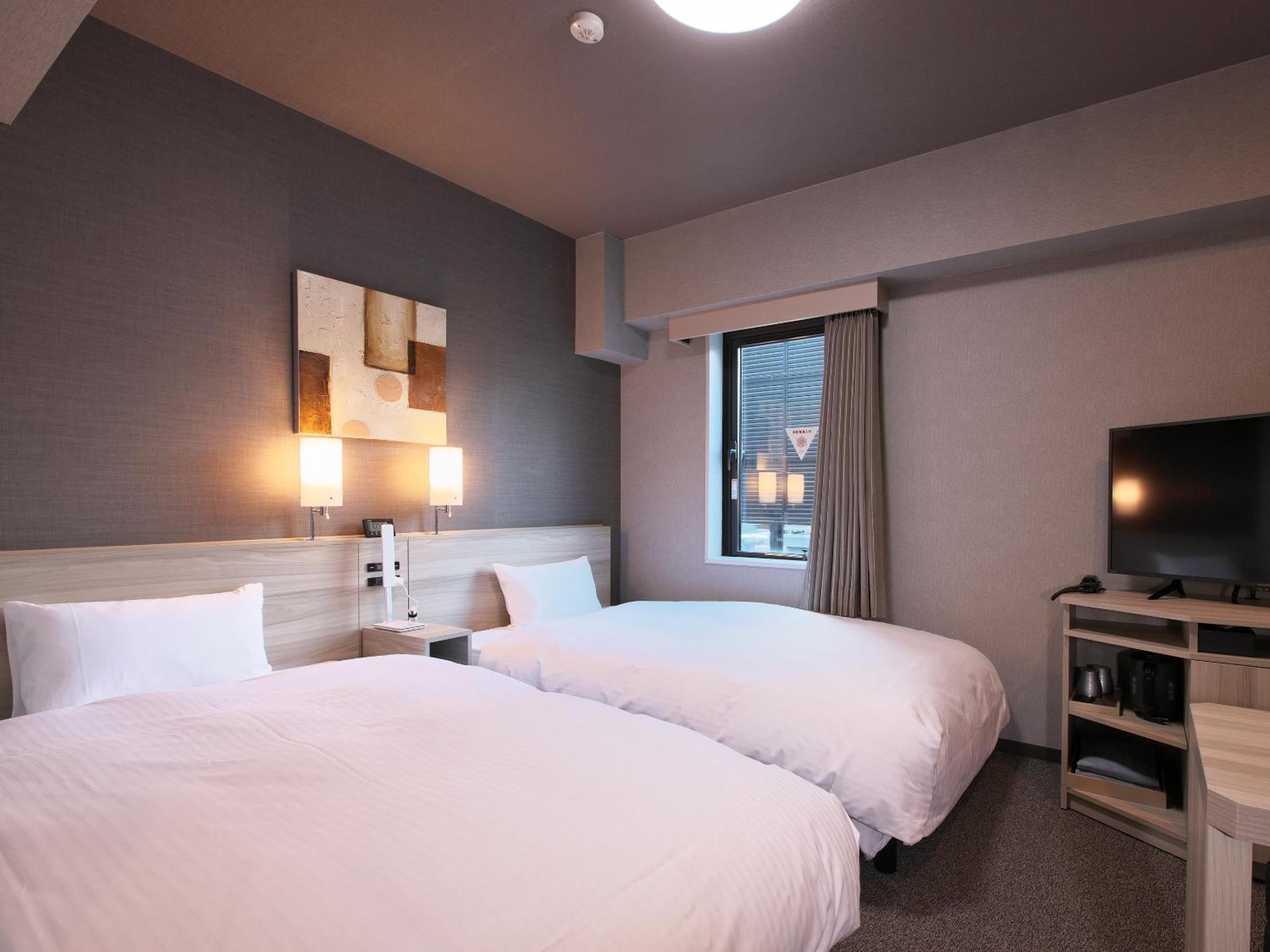 Hotel Route-Inn Toyama Ekimae Экстерьер фото